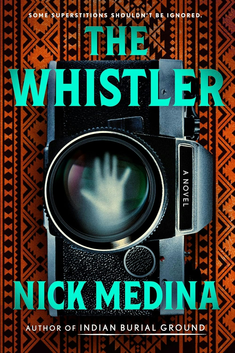 Book cover for "The Whistler" by Nick Medina, with a camera and a ghostly hand in viewfinder.
