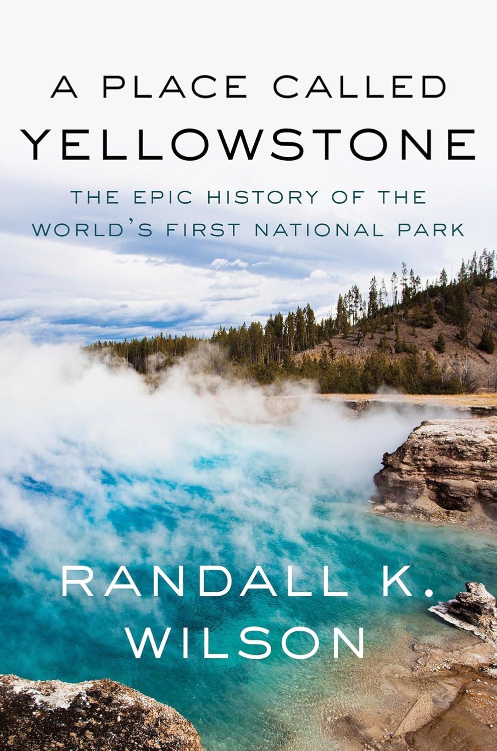 Book cover: "A Place Called Yellowstone" by Randall K. Wilson, features a geyser and trees.
