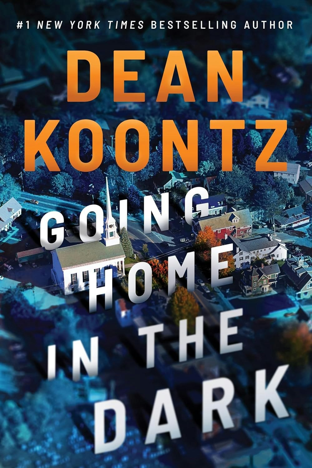 Book cover with title "Going Home in the Dark" by Dean Koontz, featuring a town aerial view.