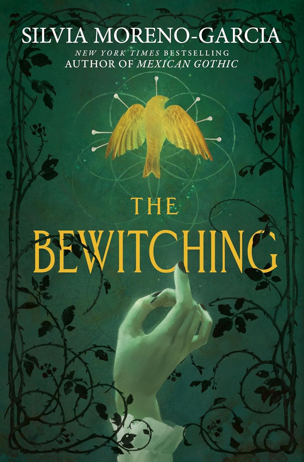 A book cover titled "The Bewitching" by Silvia Moreno-Garcia. Features a bird and a hand with vines.