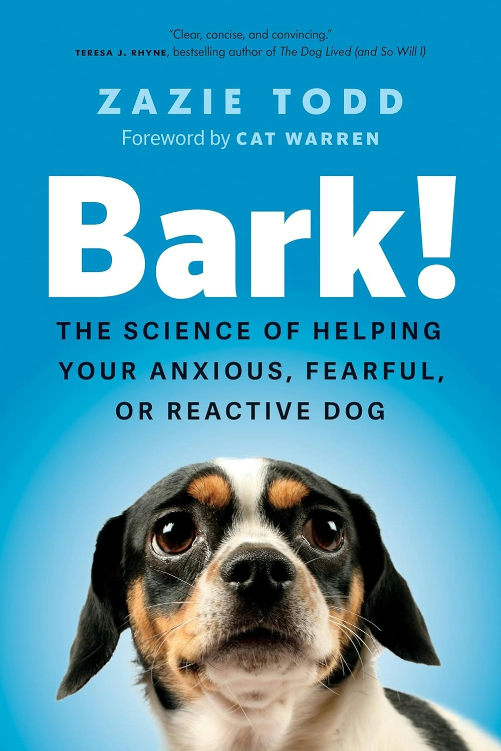 A book cover with a title about helping anxious dogs and a photo of a dog's face.