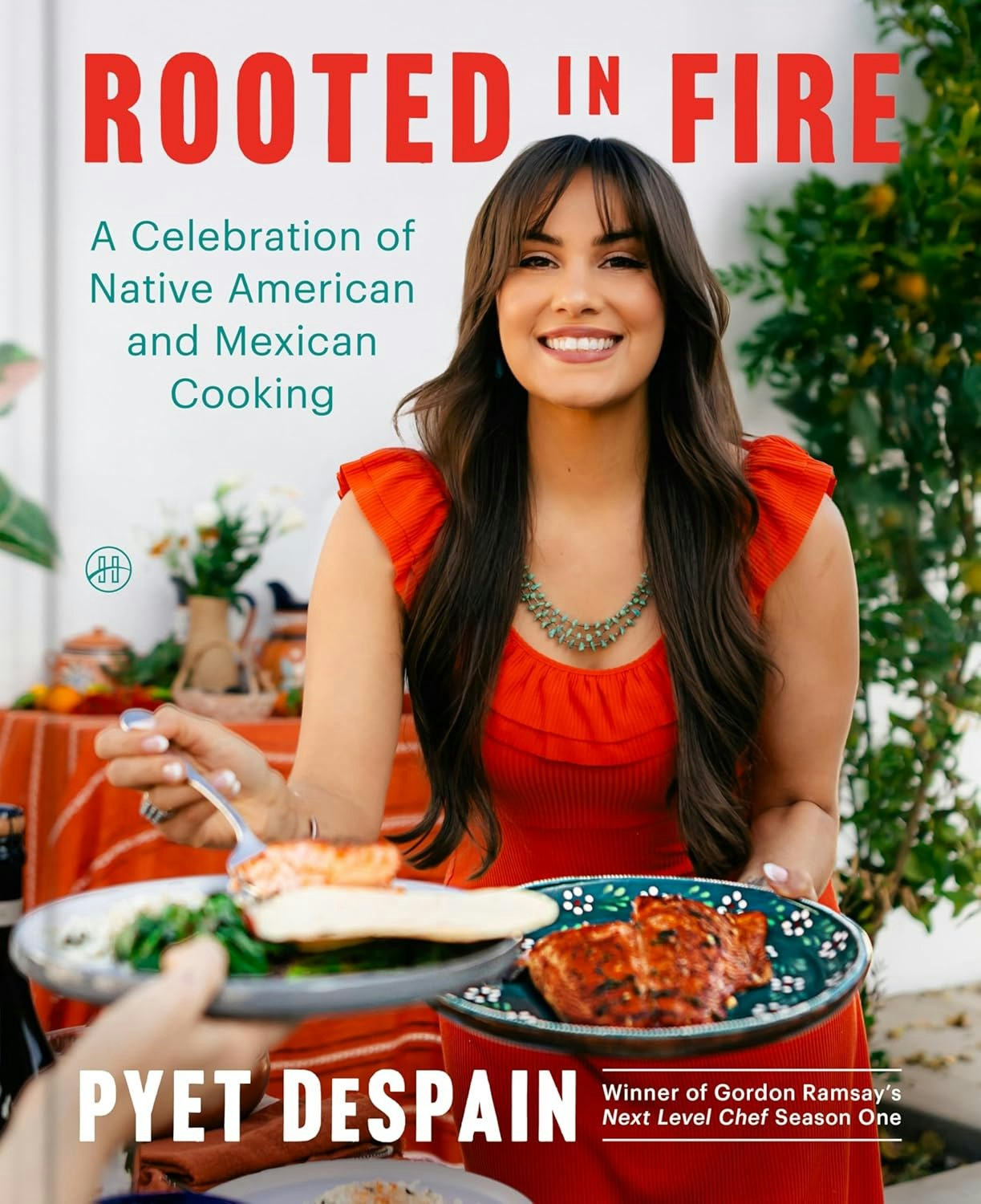 Cover of "Rooted in Fire" by Pyet DeSpain, featuring a smiling woman holding plates of food, celebrating Native American and Mexican cooking.