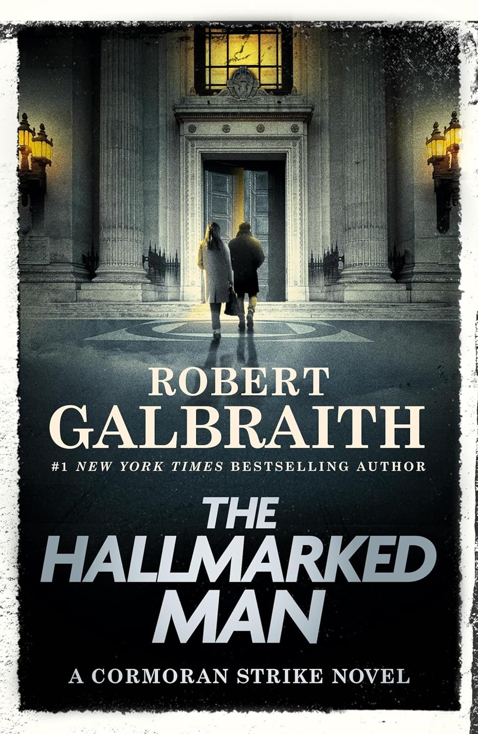 Two people entering a grand building; text: "Robert Galbraith, The Hallmarked Man, A Cormoran Strike Novel."