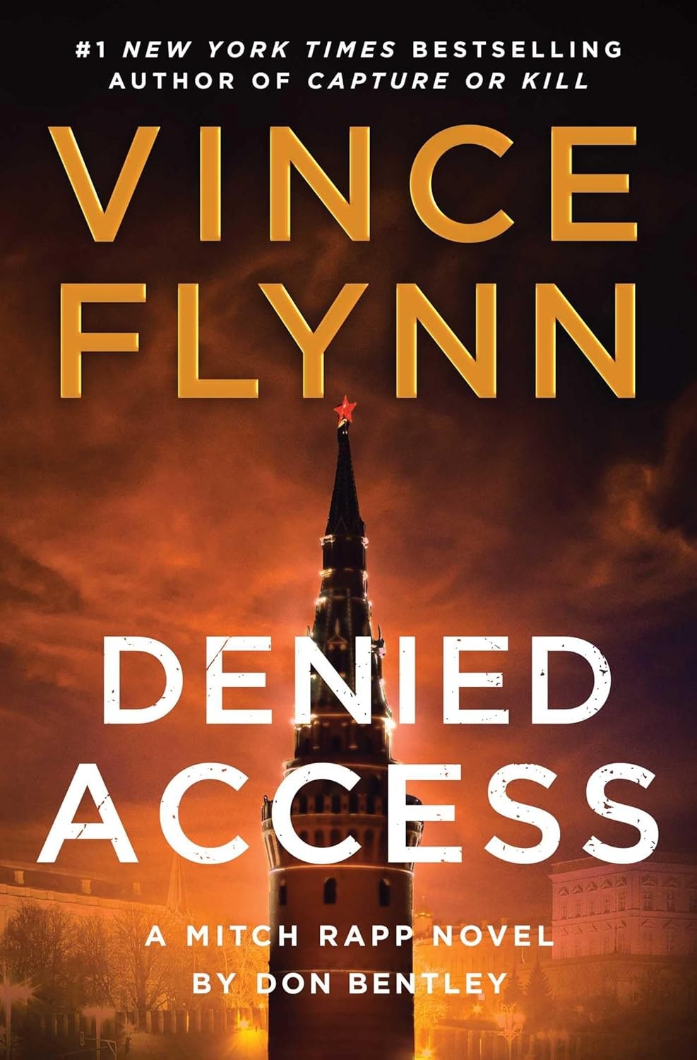 Book cover: "Denied Access" by Vince Flynn and Don Bentley, a Mitch Rapp novel. Features a tower with a star on top against a dramatic sky.