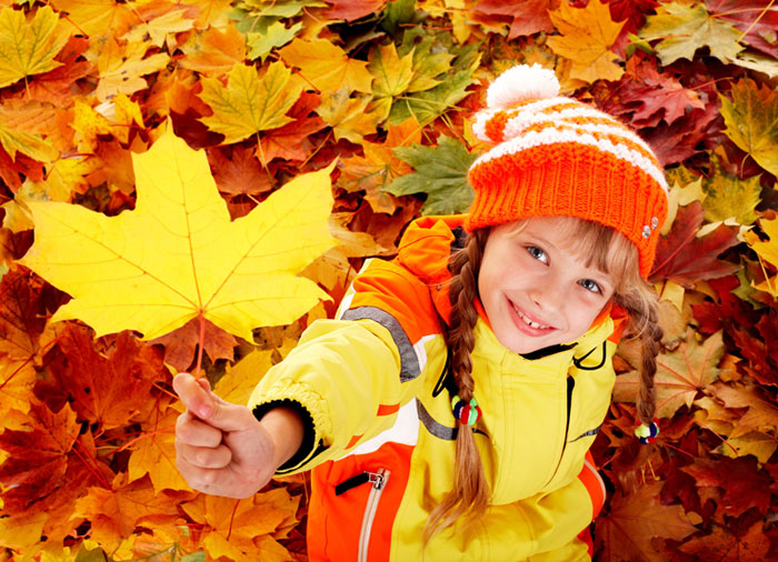 May contain: leaf, plant, portrait, photography, person, head, face, tree, coat, clothing, maple, jacket, hat, cap, finger, hand, body part, and maple leaf