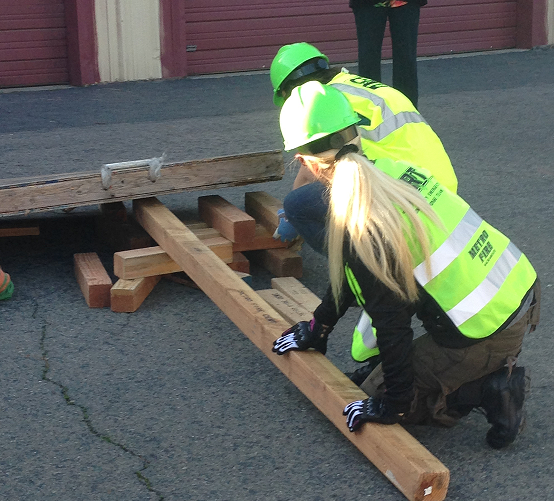 CERT members learn to use leverage to lift objects