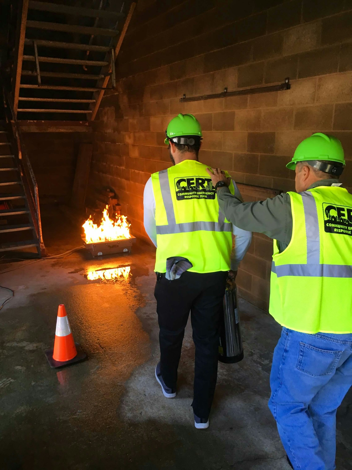 CERT members are shows how to handle small fires