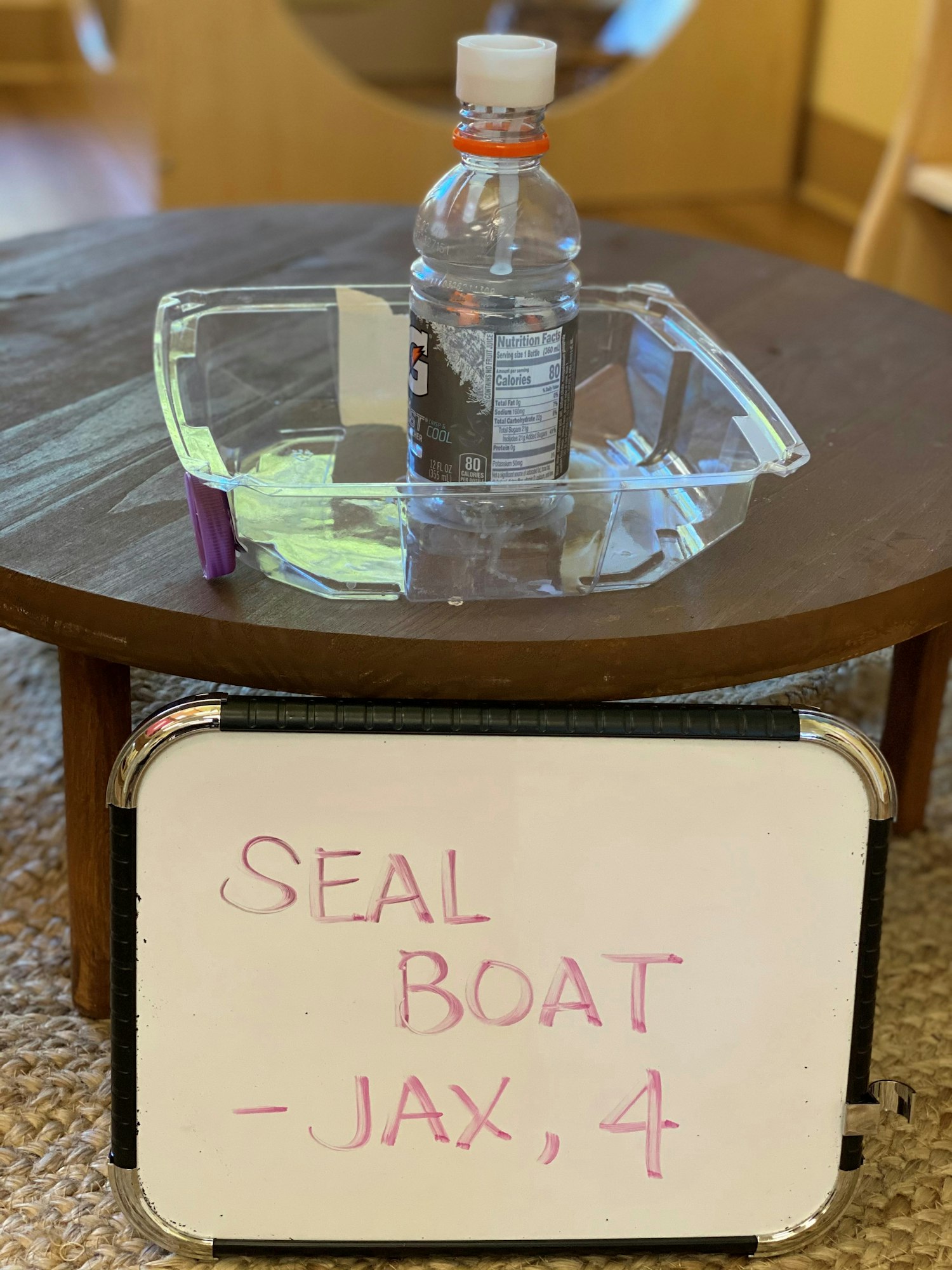 May contain: furniture, table, and box