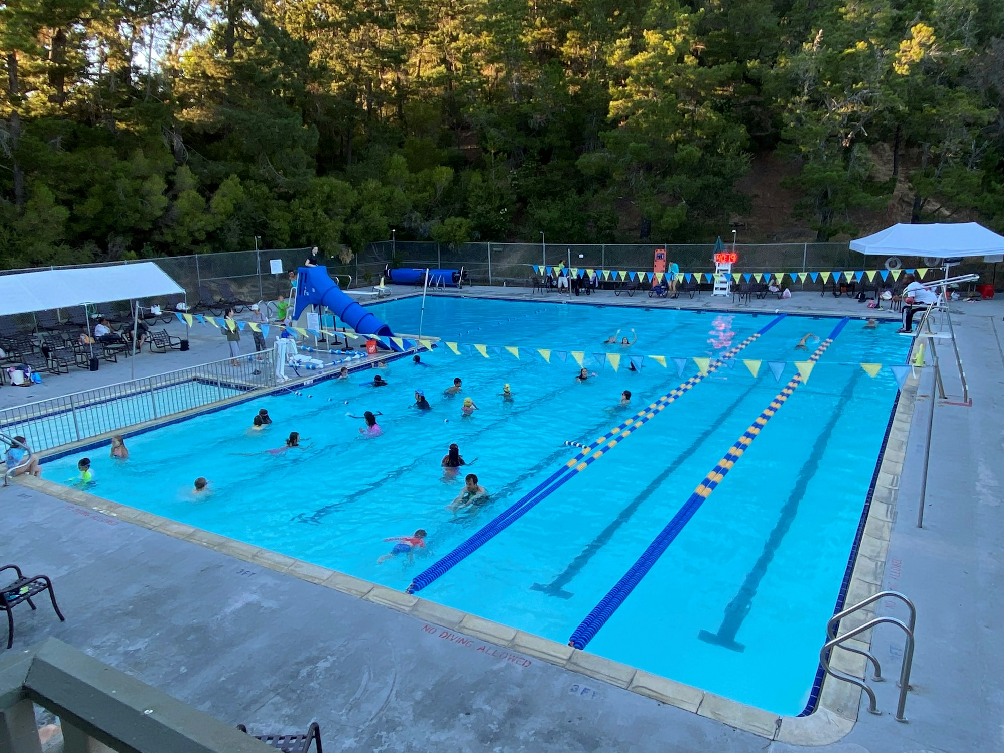 May contain: water, swimming, sport, sports, person, human, pool, and outdoors