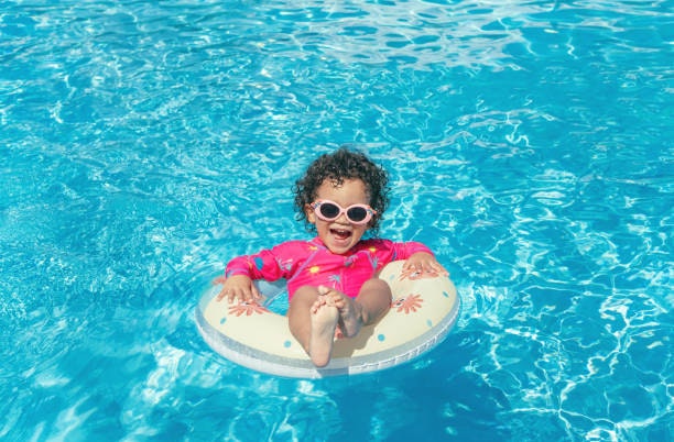 May contain: water, swimming, sport, sports, person, human, pool, goggles, accessories, and accessory