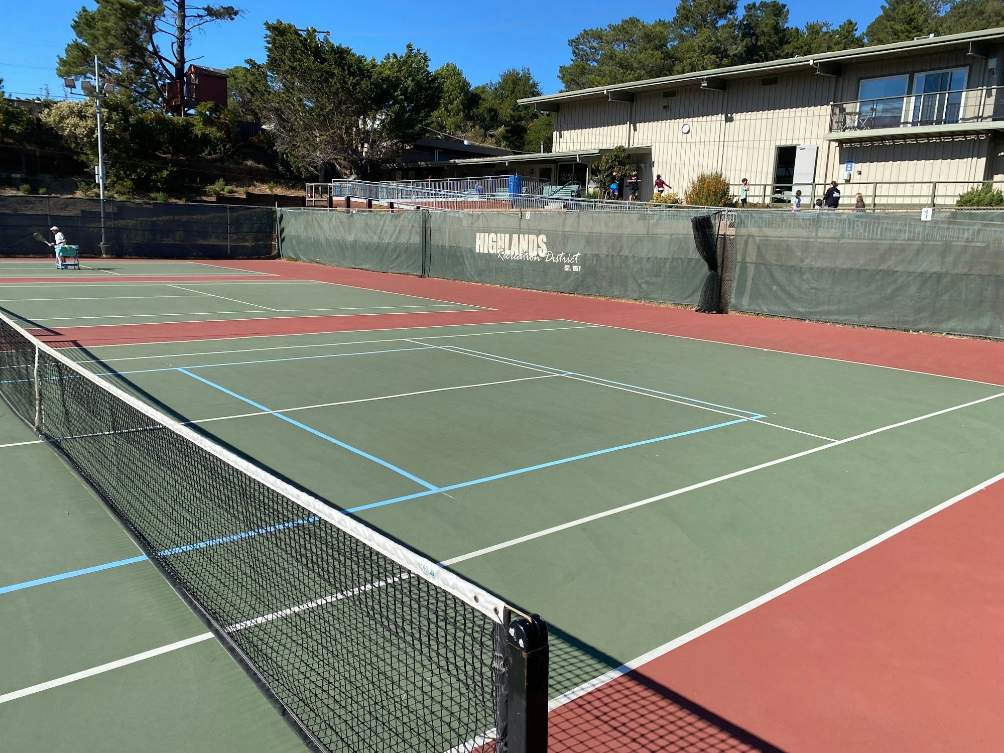 May contain: tennis court, person, sport, human, and sports