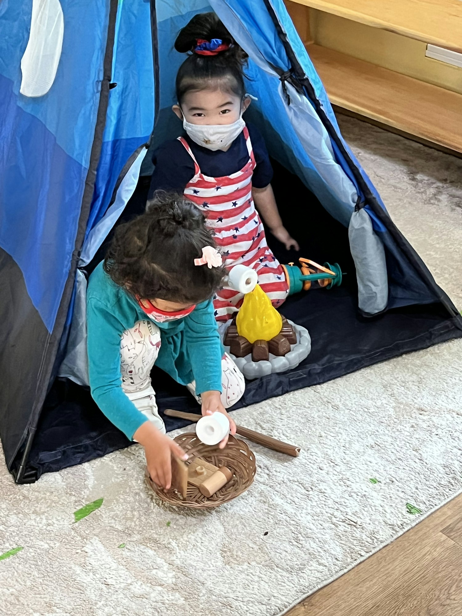 May contain: person, human, camping, and tent