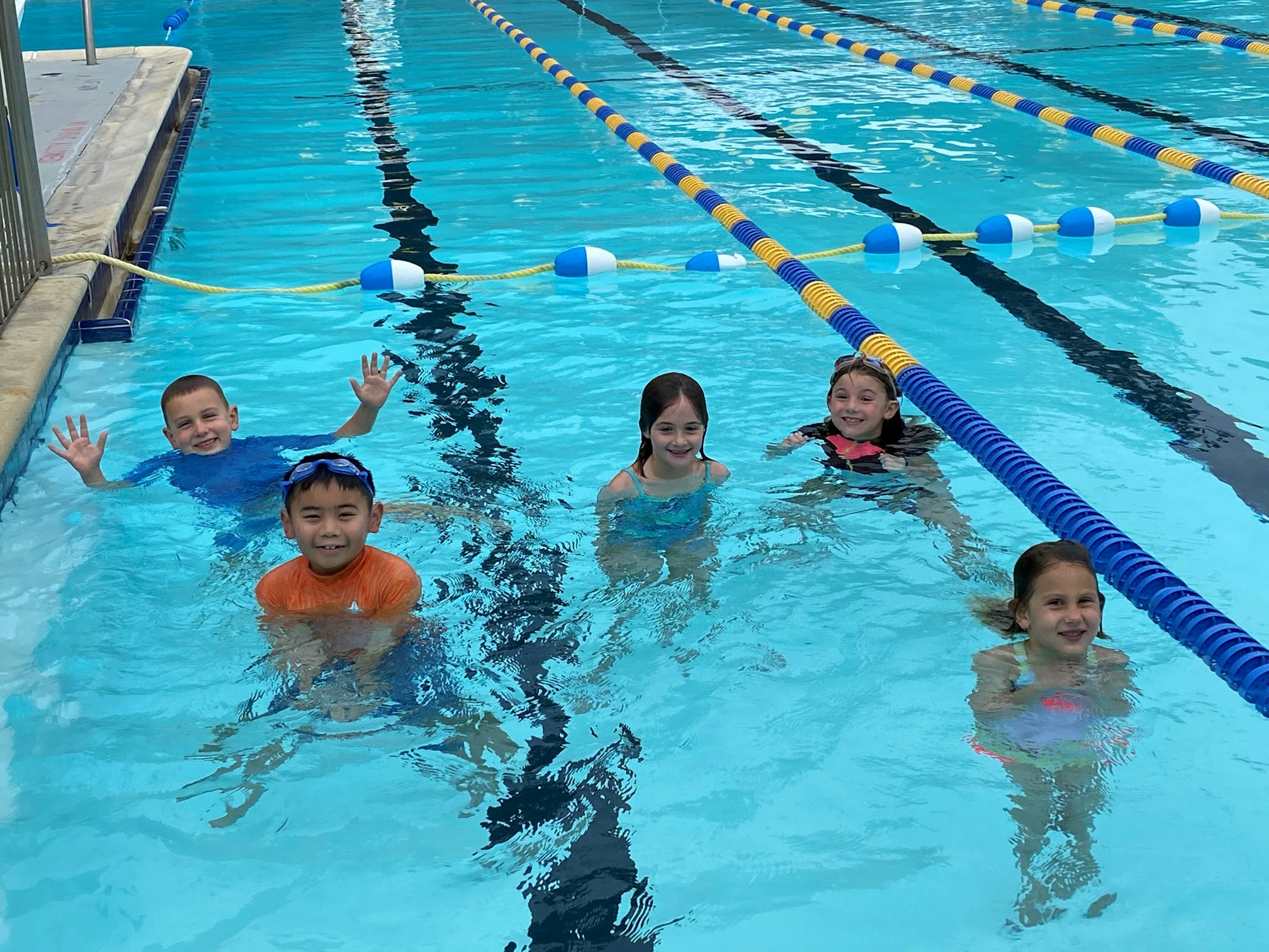 May contain: swimming, water, person, sport, human, sports, and pool