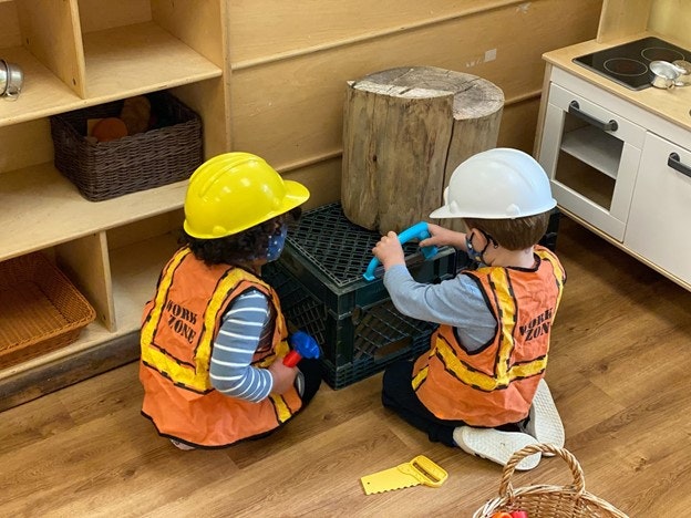 May contain: clothing, apparel, helmet, hardhat, person, human, and wood