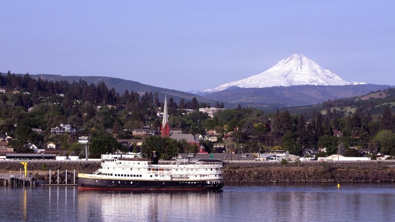 Riverboat on the river with Mt. Hood on the horizon
