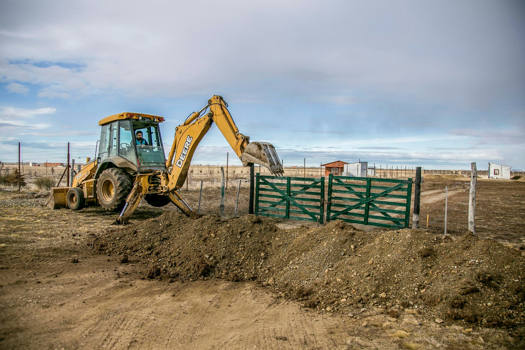 May contain: soil, gate, and machine
