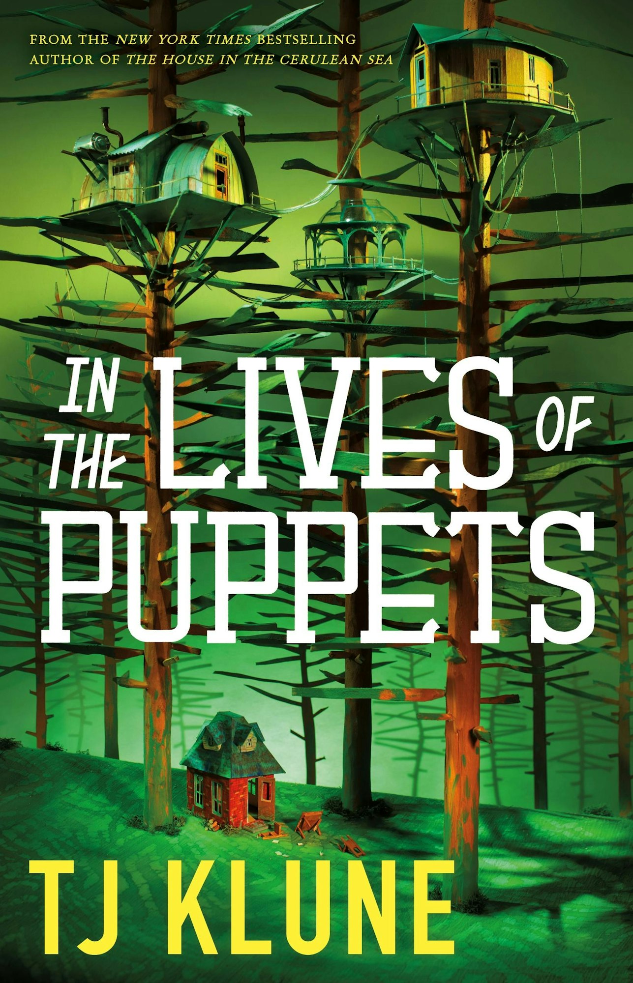 The cover of "In the Lives of Puppets" by TJ Klune features treehouses in a stylized forest.