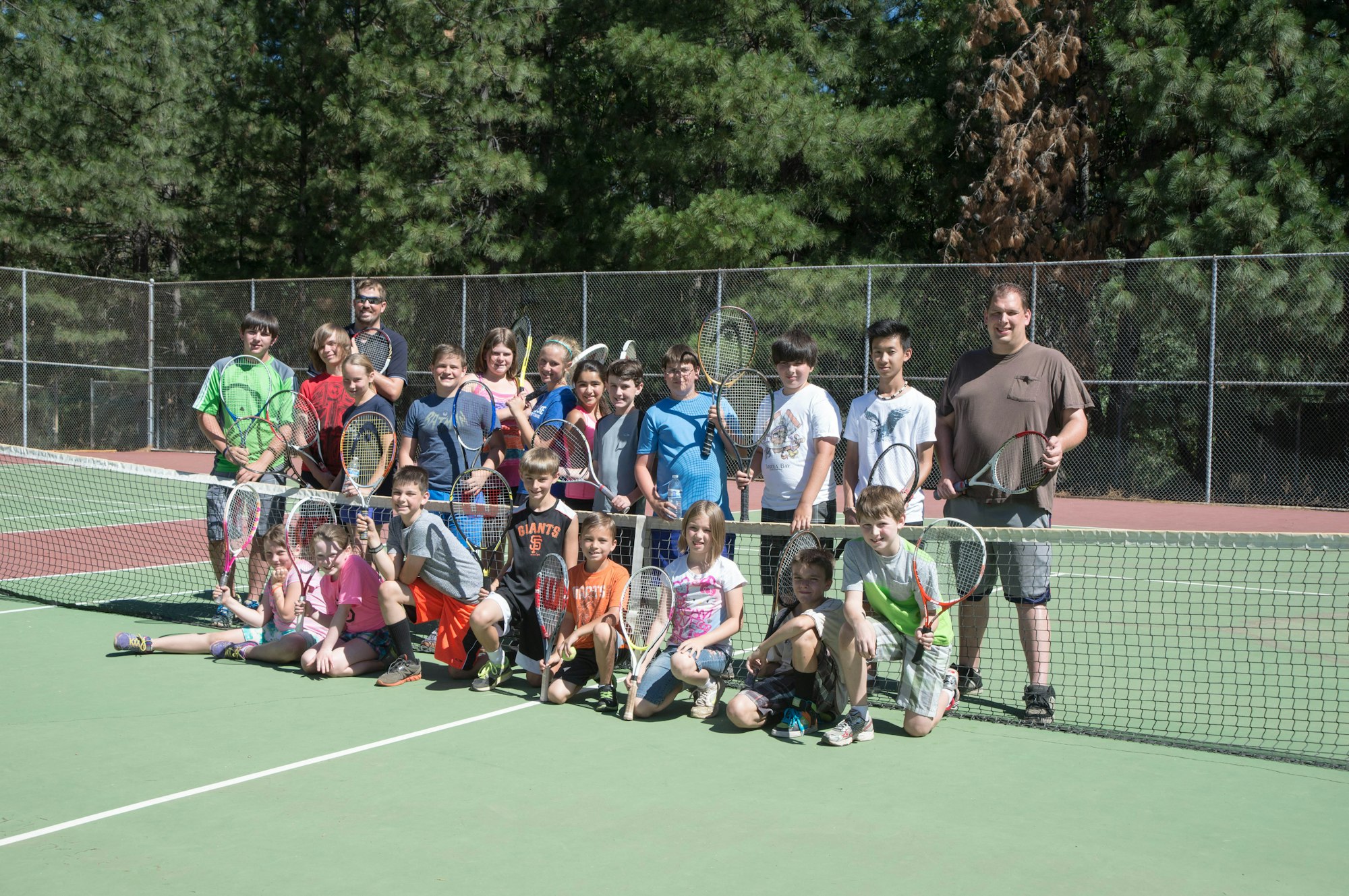 May contain: person, human, tennis court, sport, and sports