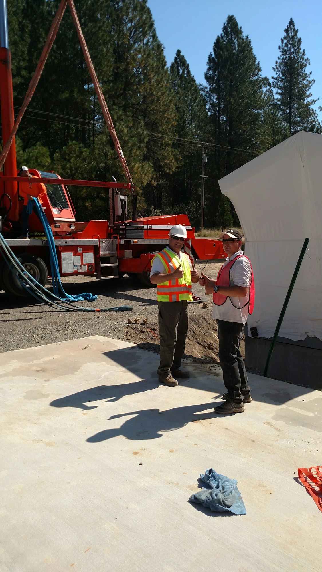 Construction workers building Crain Park Playground and restroom