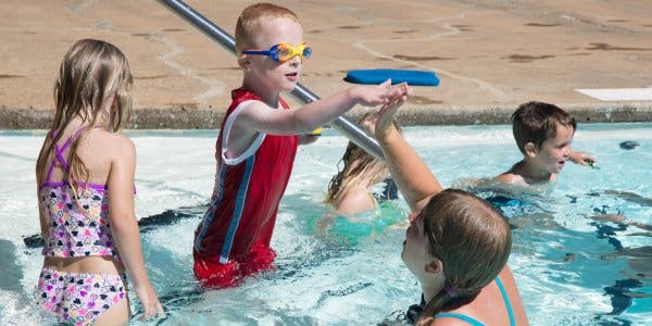 May contain: water, pool, person, human, and swimming pool