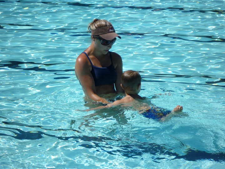 May contain: water, person, human, diving, diver, sport, sports, sunglasses, accessories, accessory, swimming, clothing, and apparel