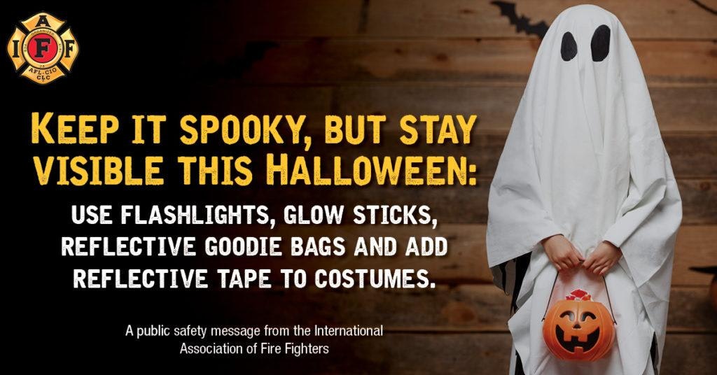 Ghost costume promoting Halloween safety: use flashlights, glow sticks, reflective bags, and tape for visibility. Safety advice by IAFF.