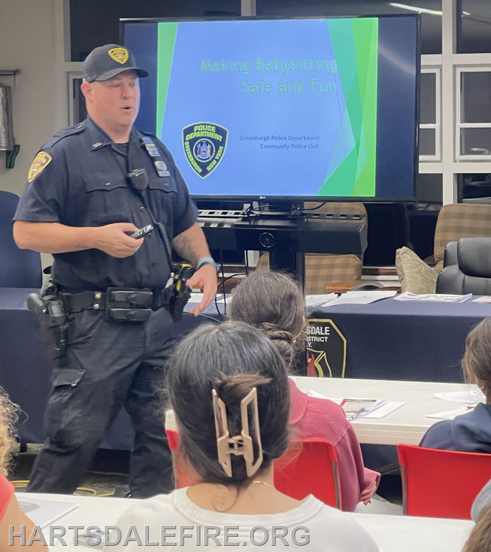 A police officer presents a babysitting safety workshop, focusing on making babysitting safe and fun.