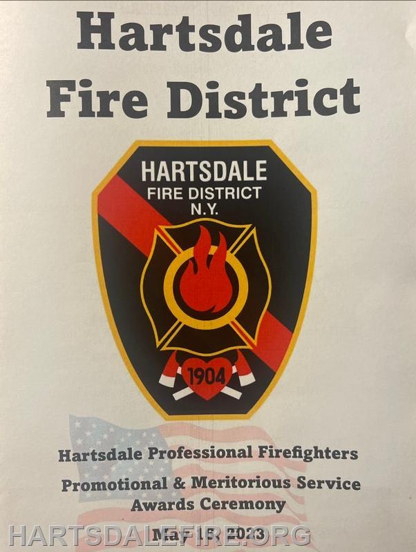 Hartsdale Fire District emblem, N.Y., 1904. Promotional & Meritorious Service Awards Ceremony for firefighters, US flag background.