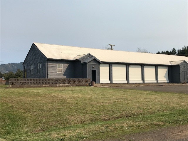 May contain: architecture, building, outdoors, shelter, grass, plant, and nature