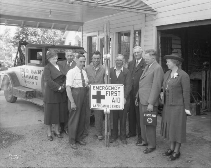 Historical Black and white photo of EMS team