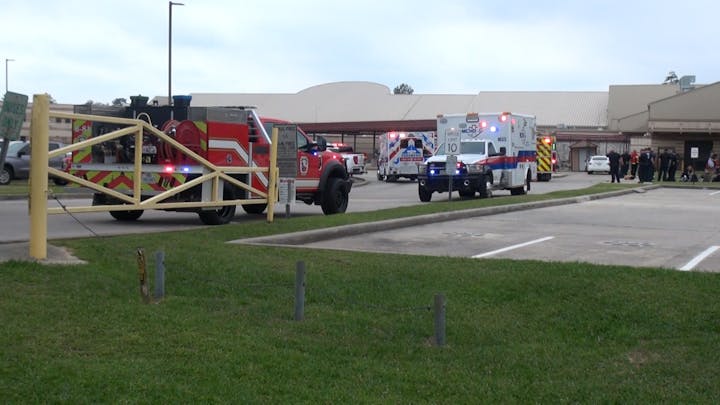 May contain: machine, wheel, transportation, vehicle, truck, fire truck, car, fire station, and person