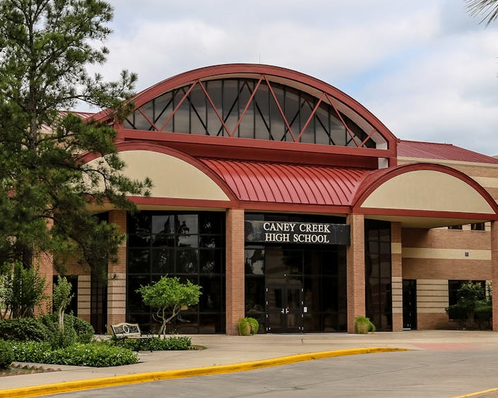 May contain: architecture, building, outdoors, shelter, bench, furniture, city, plant, tree, and urban