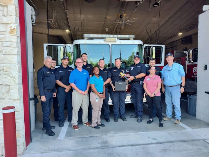 May contain: adult, male, man, person, clothing, footwear, shoe, transportation, vehicle, pants, jeans, wristwatch, people, and truck