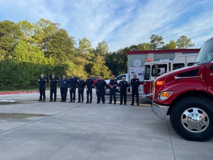 May contain: person, fire truck, transportation, truck, and vehicle