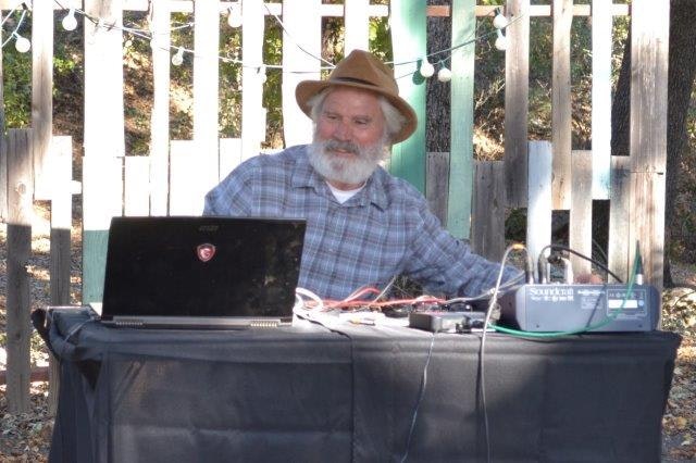 May contain: person, human, pc, computer, electronics, laptop, hat, clothing, apparel, and face