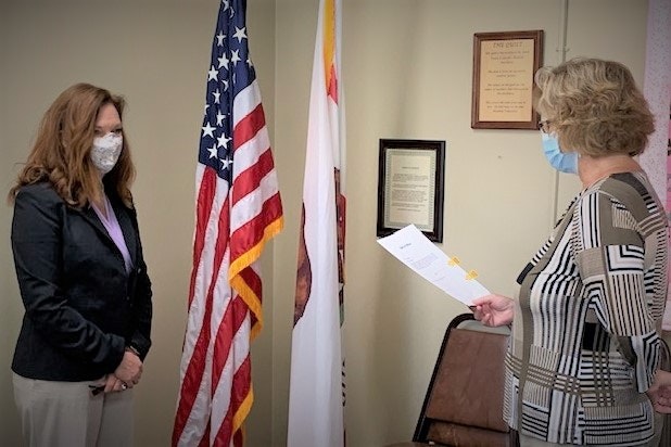 Lori Hack is sworn into office by President, Lin Reed on 8/26/2020