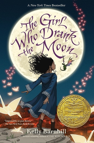 Cover of "The Girl Who Drank the Moon" by Kelly Barnhill, featuring a girl with a dragon and a large moon, with a medal on the cover.