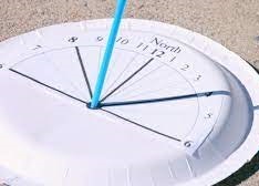 May contain: sundial