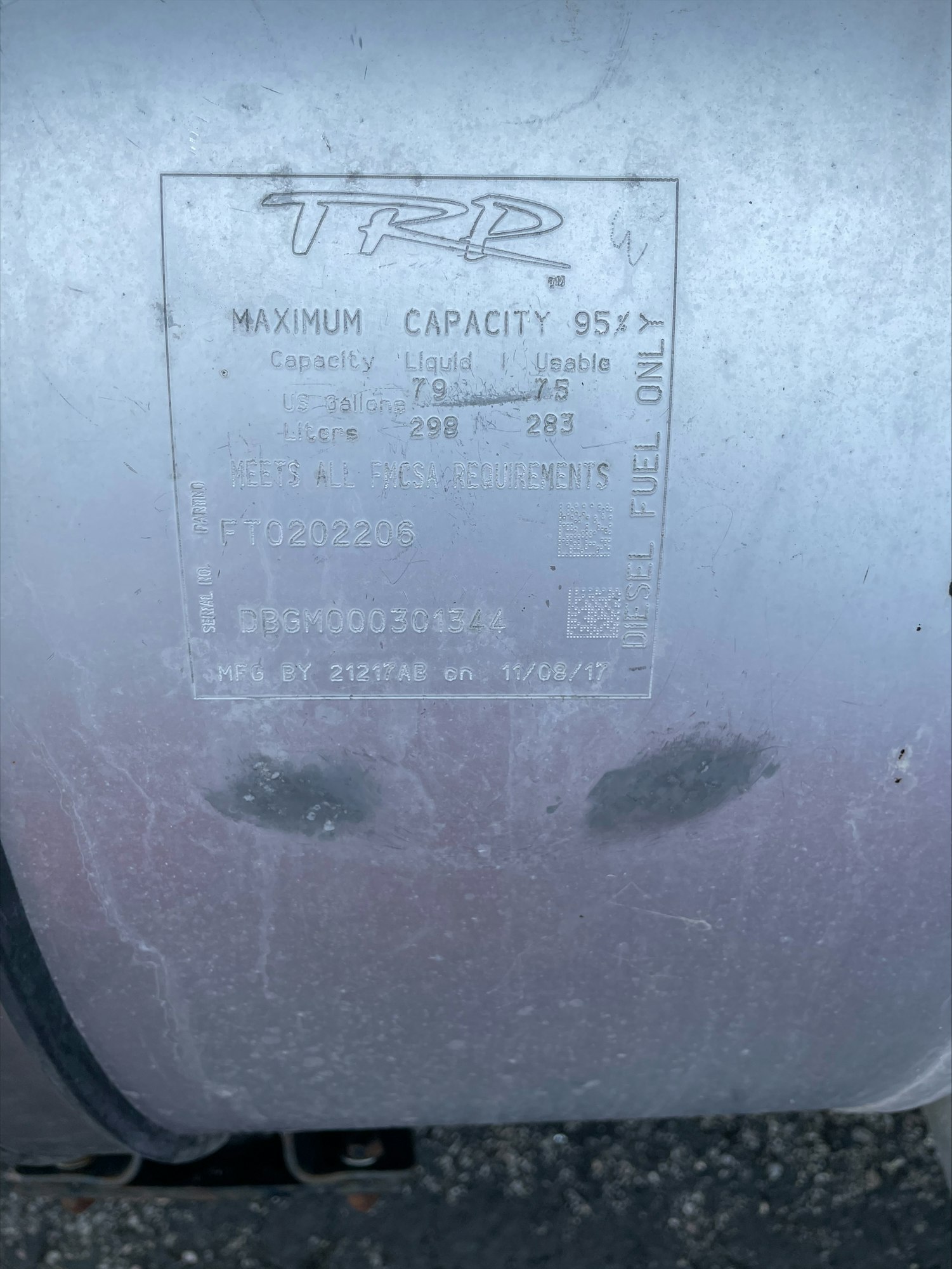 A label showing fuel tank capacity details marked with "TRD", indicating a 95% maximum liquid capacity of 79 US gallons, for diesel fuel.