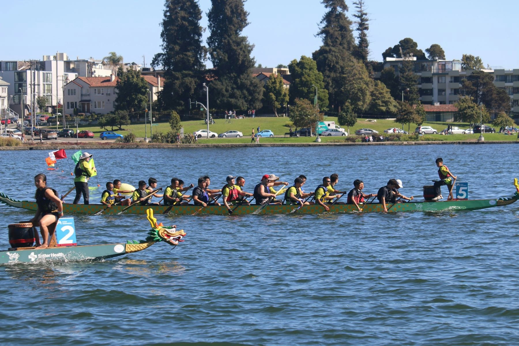 May contain: person, human, oars, rowboat, vehicle, boat, and transportation