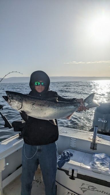 Person holding fish