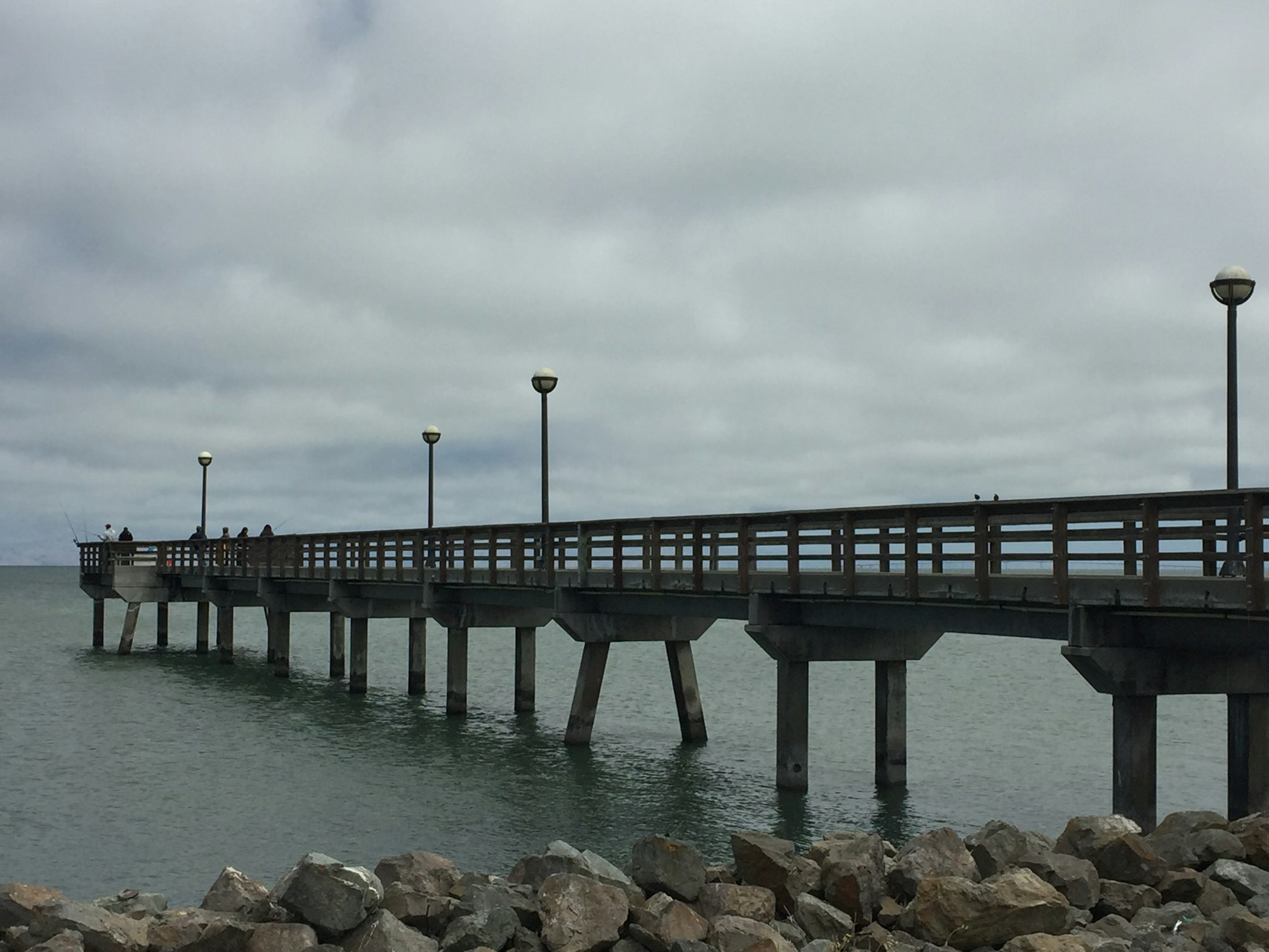 May contain: water, waterfront, port, pier, dock, bridge, and building