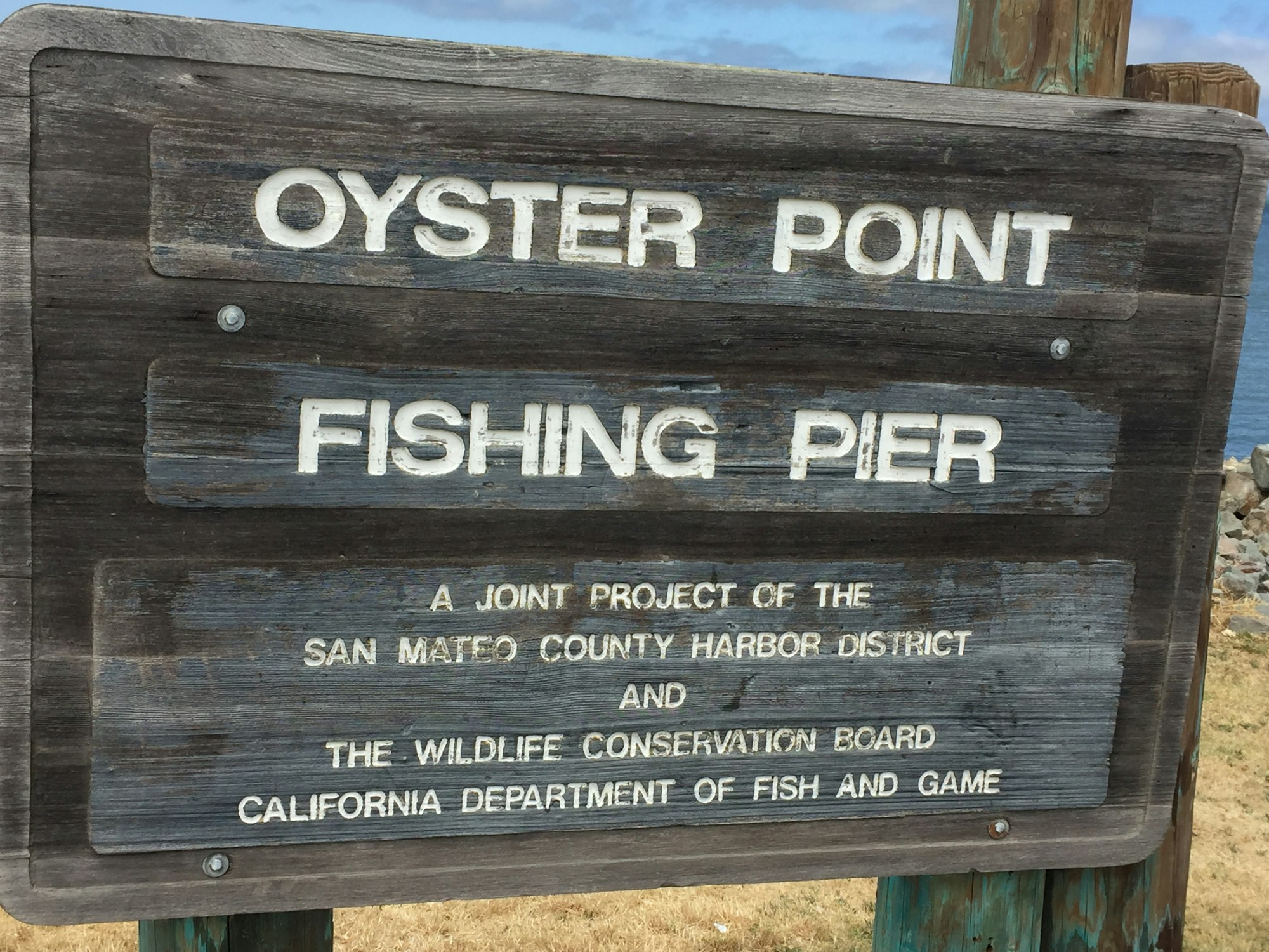 Fishing Pier Sign at Oyster Point Marina