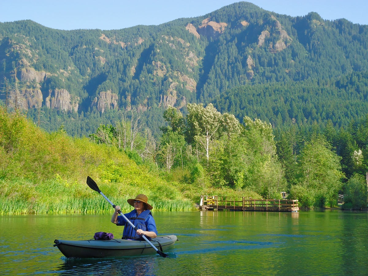 May contain: boat, canoe, kayak, rowboat, transportation, vehicle, nature, outdoors, scenery, water, canoeing, leisure activities, person, sport, and water sports