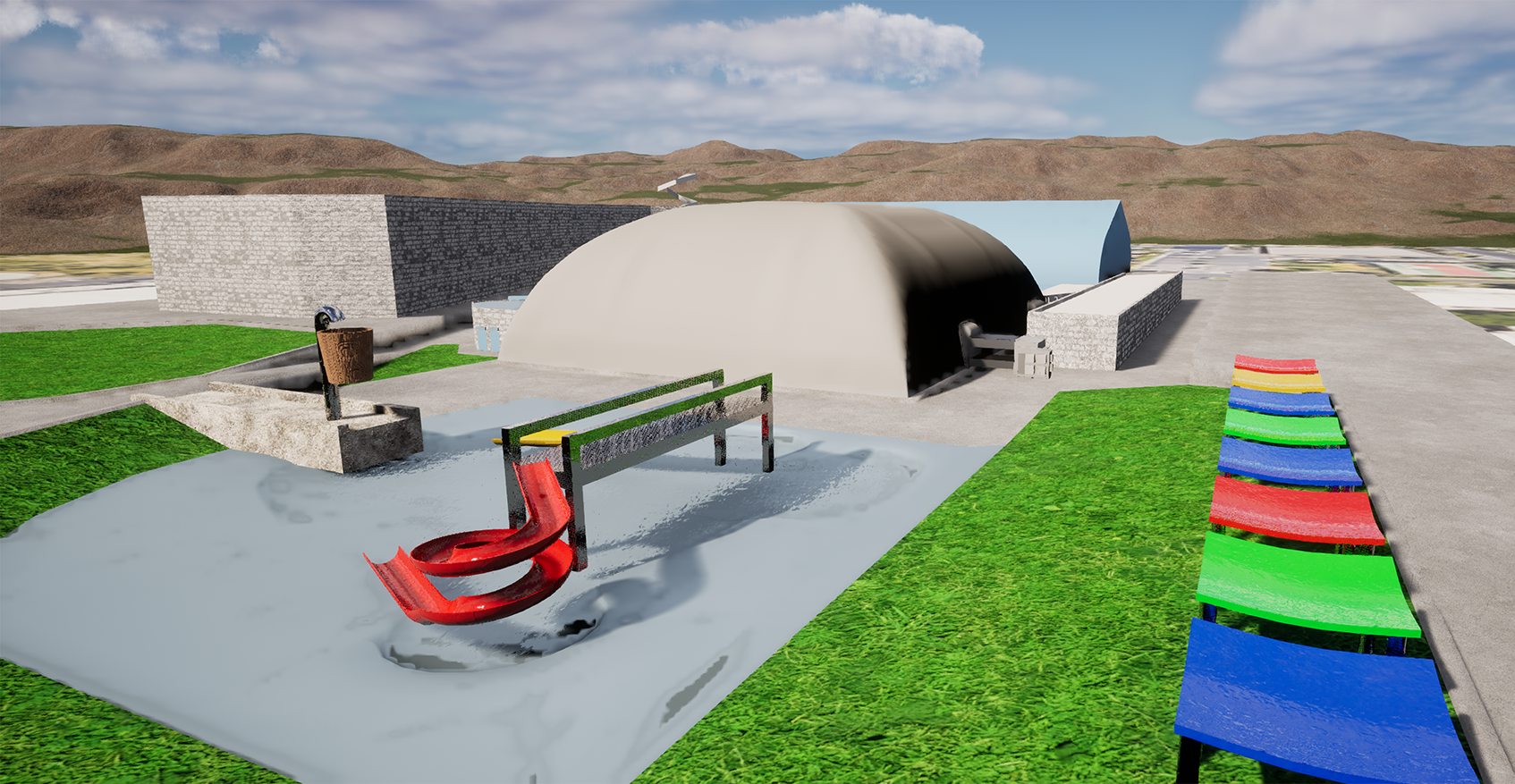 A playground with colorful canopies, a small slide in water, structures, and a grassy area. Desert landscape in the background.