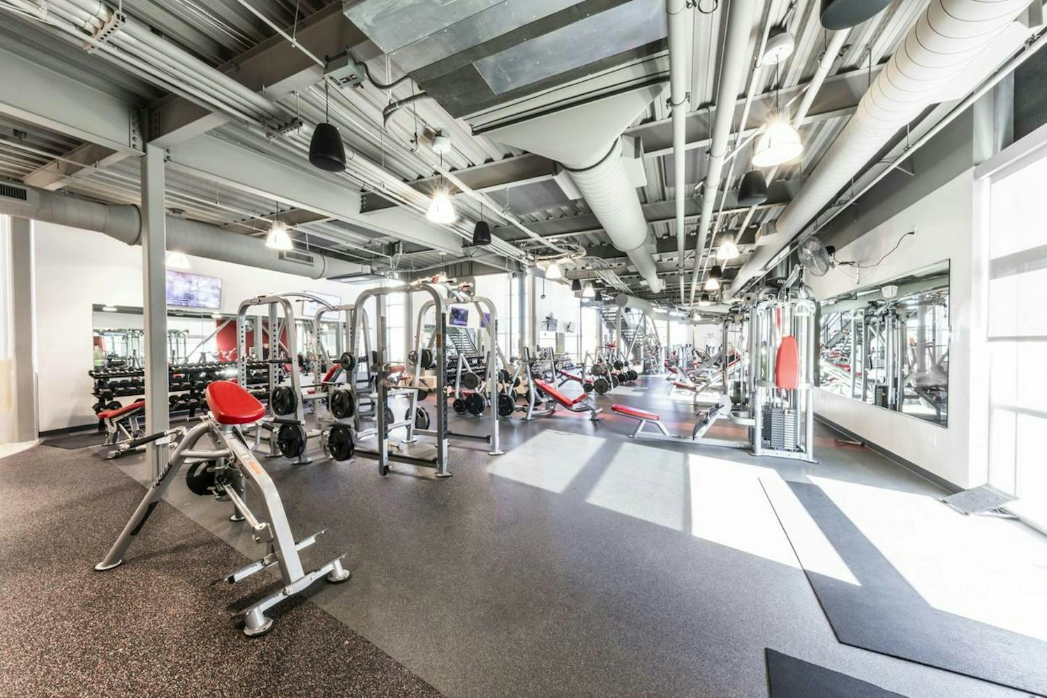 Modern gym interior with equipment.