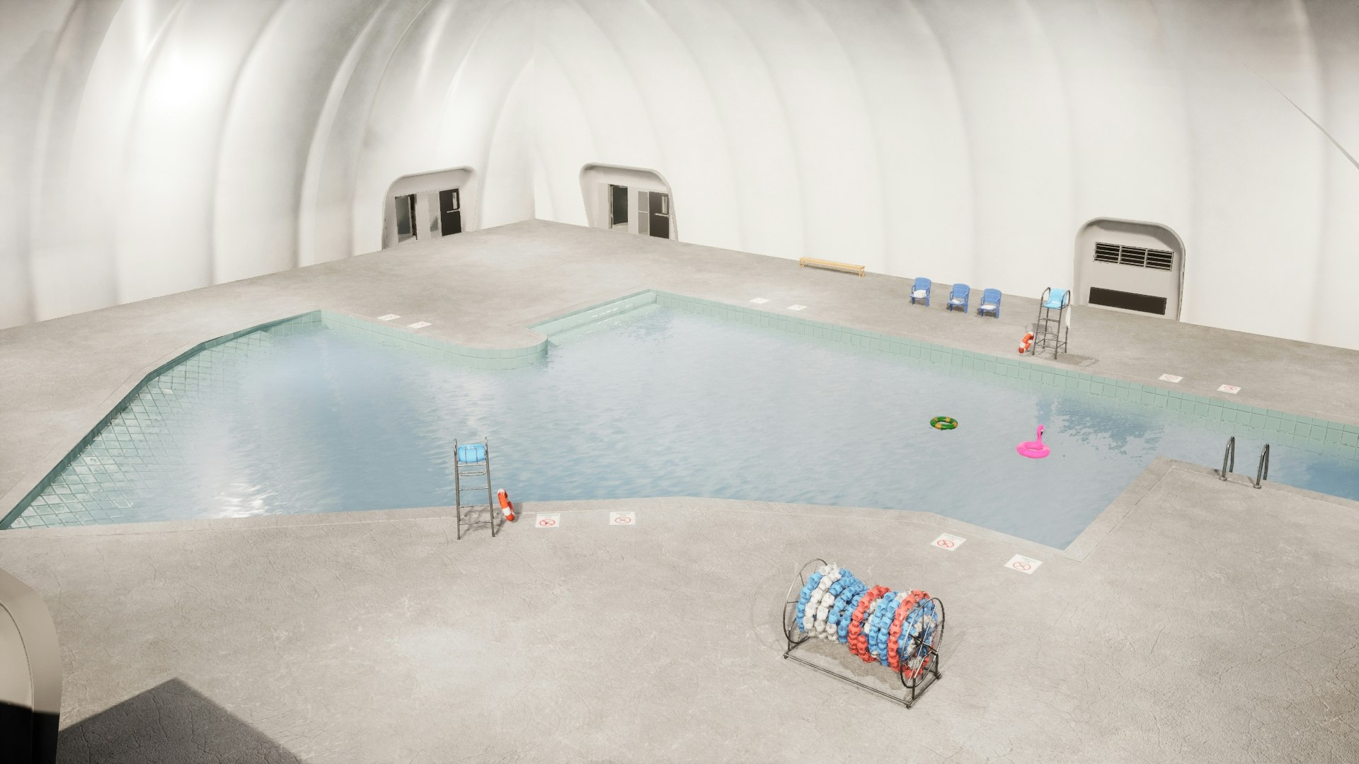 Indoor swimming pool with lifeguard chairs, pool noodles, a flamingo float, and loungers.