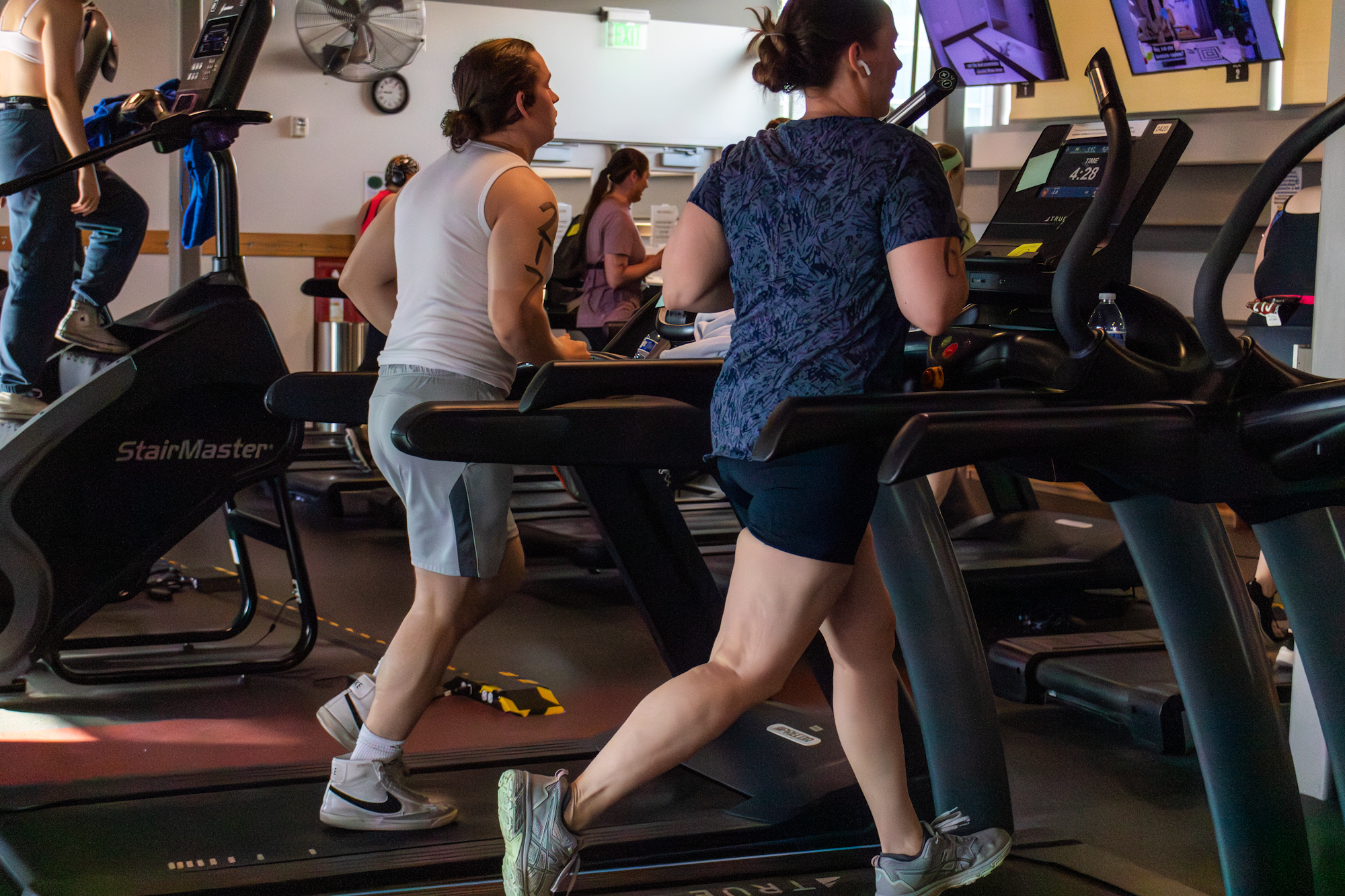 Runners on treadmills