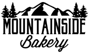Logo with mountains, trees, and words "Mountainside Bakery."