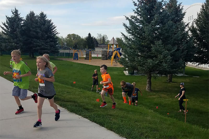 Photo of kids running